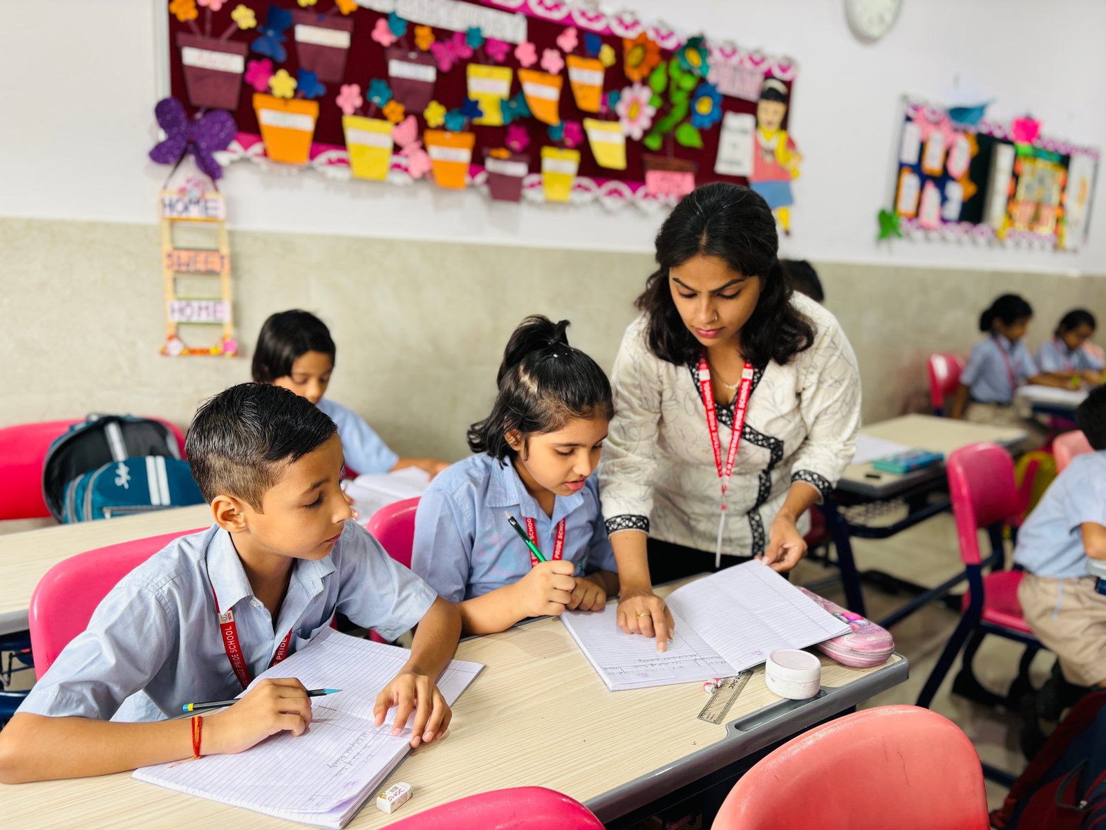 Children sitting on classroom floor
